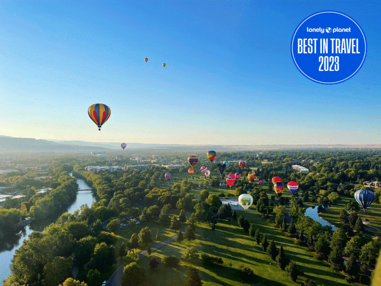 Hot air balloons floating over Anne Morison park